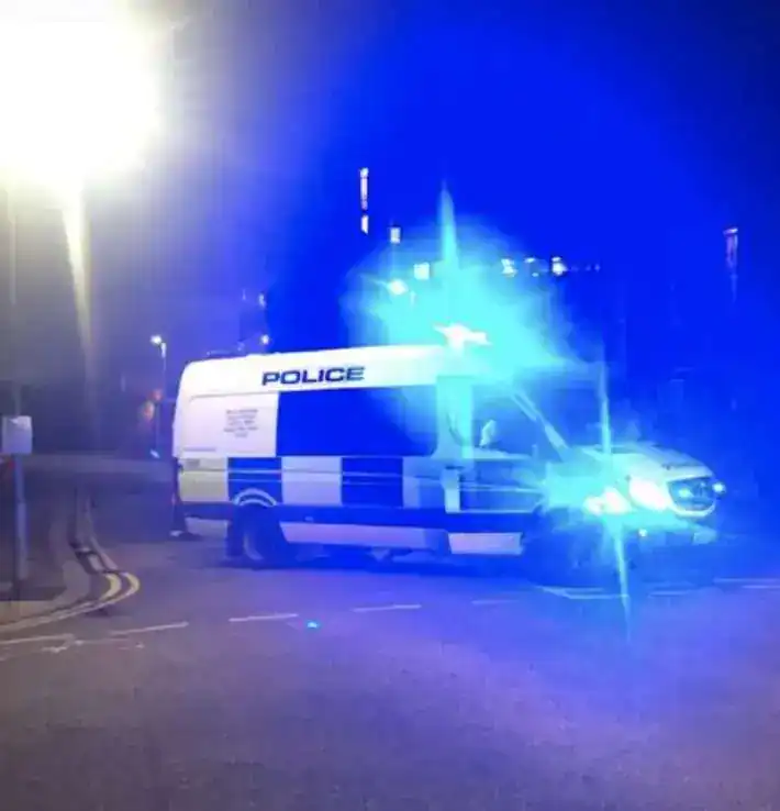 Man Critical After Queensbury Flat Stabbing – 43-Year-Old Arrested for Attempted Murder