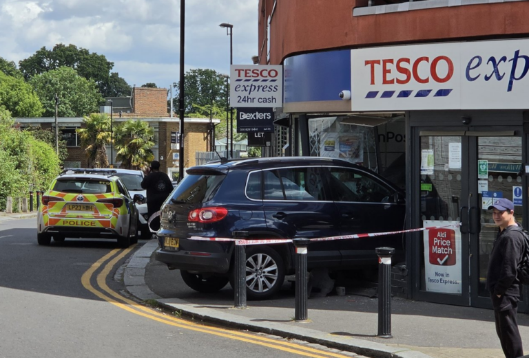 Woman Arrested Following Vehicle Collision with Storefront